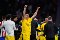 Bodö/Glimts Jostein Gundersen jublar med lagkompisarna. Foto: AP PhotoFernandez